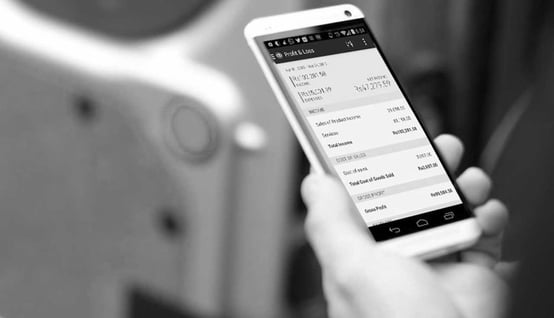 QuickBooks on phone-bw