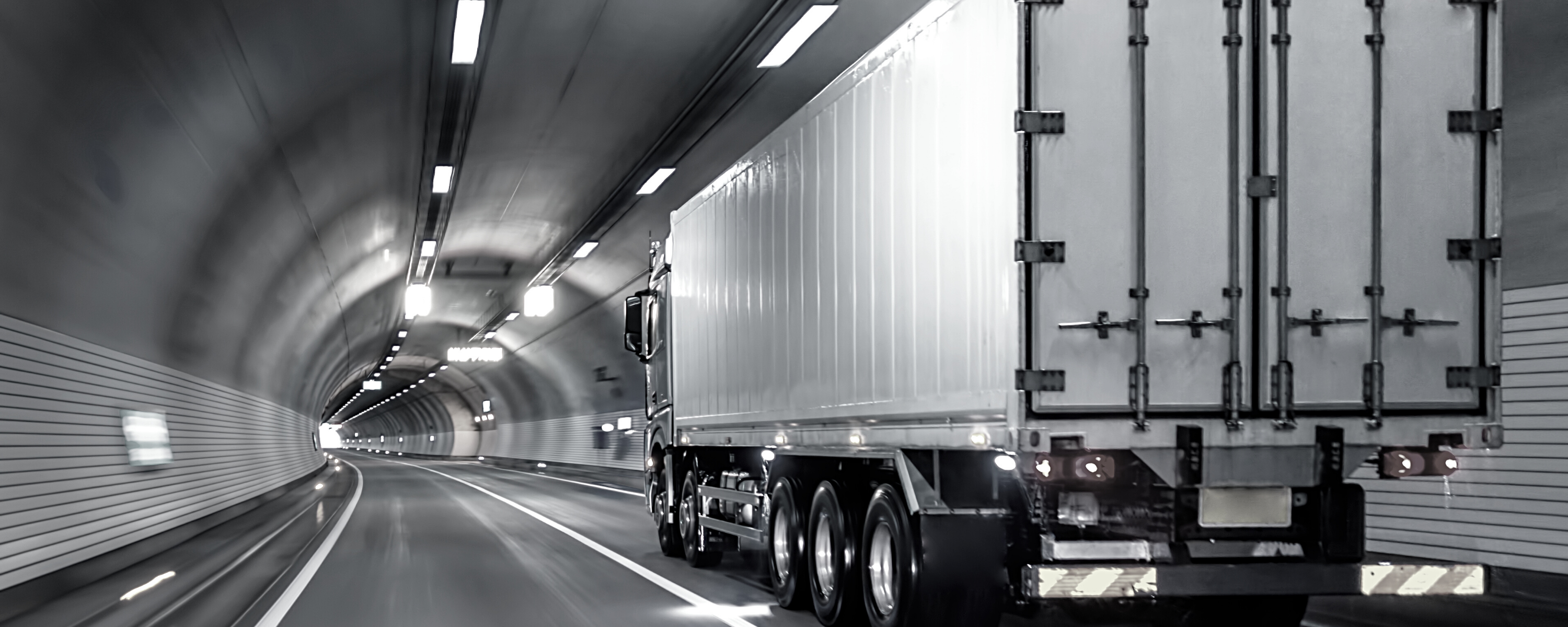 Truck travelling through a tunnel